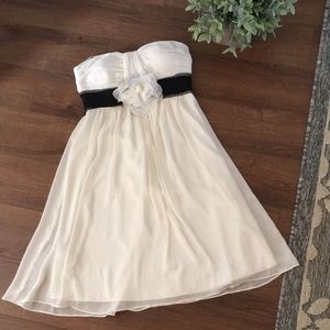 Ivory and black strapless dress